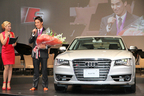 「The new Audi S Model」記者発表会　花束で迎えられた競泳男子メダリストの松田丈志選手