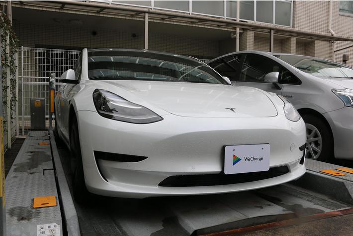 日栄インテックの機械式駐車装置が電気自動車充電サービス「WeCharge」と連携