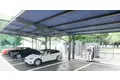 afterFIT、双日、ミライト・ワンが磯子カンツリークラブに先進的なグリーンソリューションを提供　蓄電池・EV充電スタンド併設型ソーラーカーポートを導入