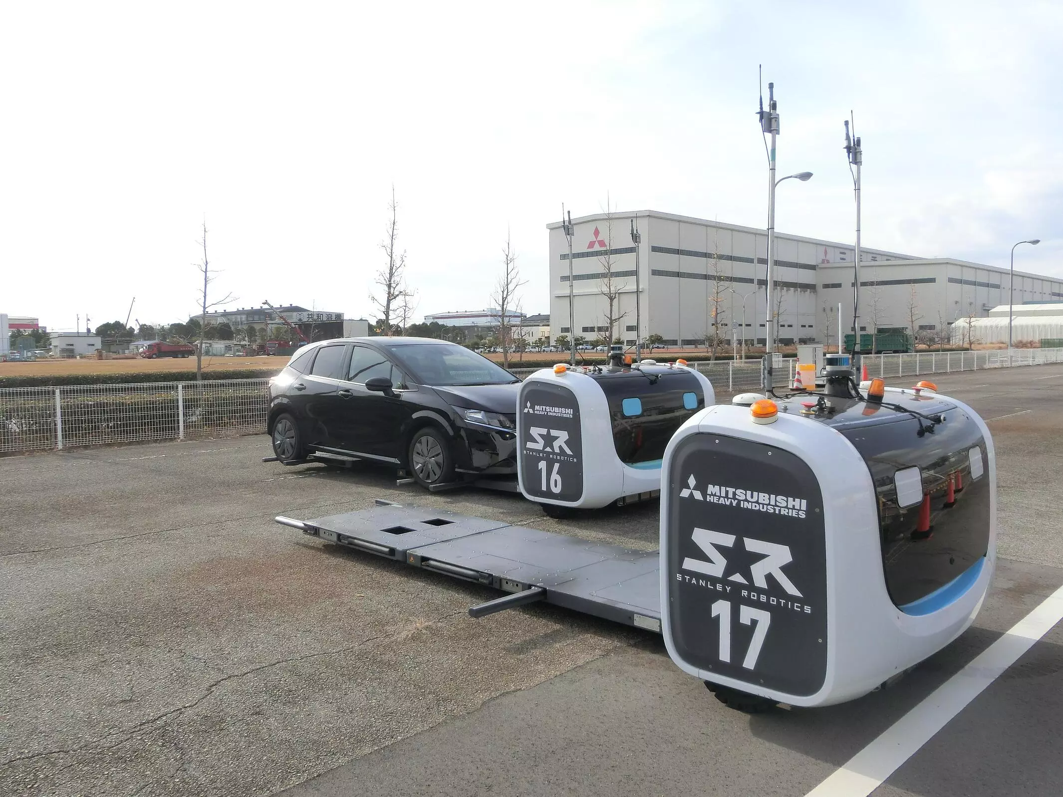 三菱重工機械システム、車両搬送ロボットの実証試験を沖縄・中城湾港で