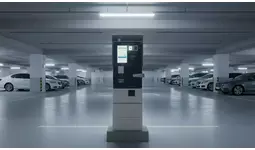 スマート駐車場システム「DENNOU PARK」loT精算機の安定性を向上する技術アップデートを実施。駐車場業界でAI×ハード統合が進む。