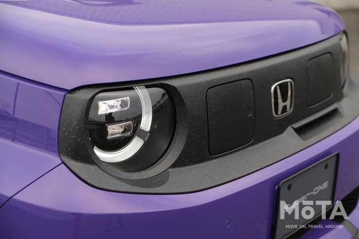 ［4/27］ホンダ 新型スーパーワン 外観 フロント：特徴的な円形のLEDヘッドライトと、中央のHエンブレムを配したシンプルなグリルデザイン