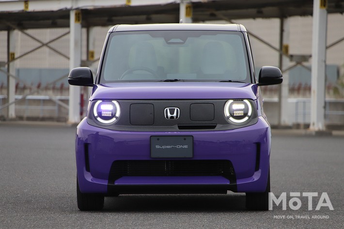 ［2/27］ホンダ 新型スーパーワン 外観 フロント：上空に向かって放たれる雷をモチーフに採用した、専用色の「ブーストバイオレット・パール」をまとったフロントビュー